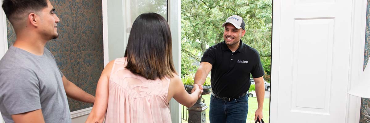 couple greeting technician