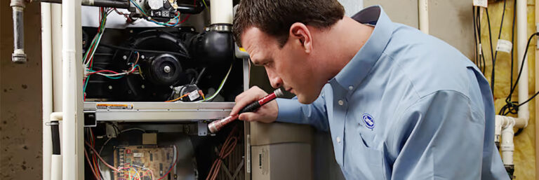 tech-performs-furnace-blower-motor-repair