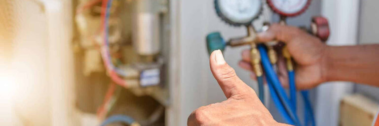 technician performing HVAC maintenance